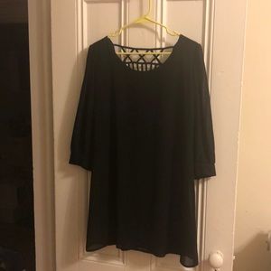 Black mini dress with open back detail